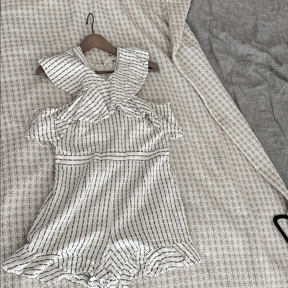 AMUR Ivory and black Patterned romper